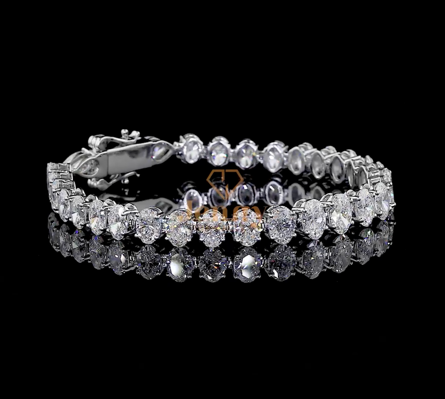 Oval-Cut Diamond Tennis Bracelet crafted in premium gold, showcasing a timeless design with exceptional brilliance and refined elegance.