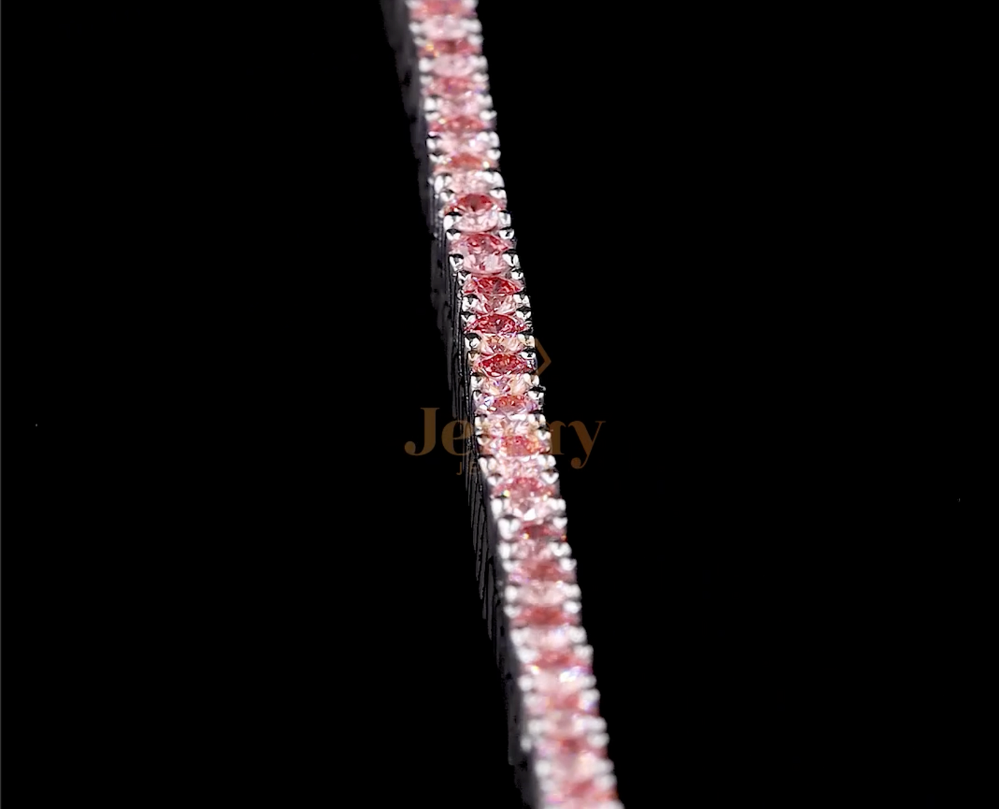 Pink Tennis Bracelet with lab-grown pink diamonds set in white, yellow, or rose gold. A sophisticated and romantic jewelry piece, perfect for layering or wearing solo.