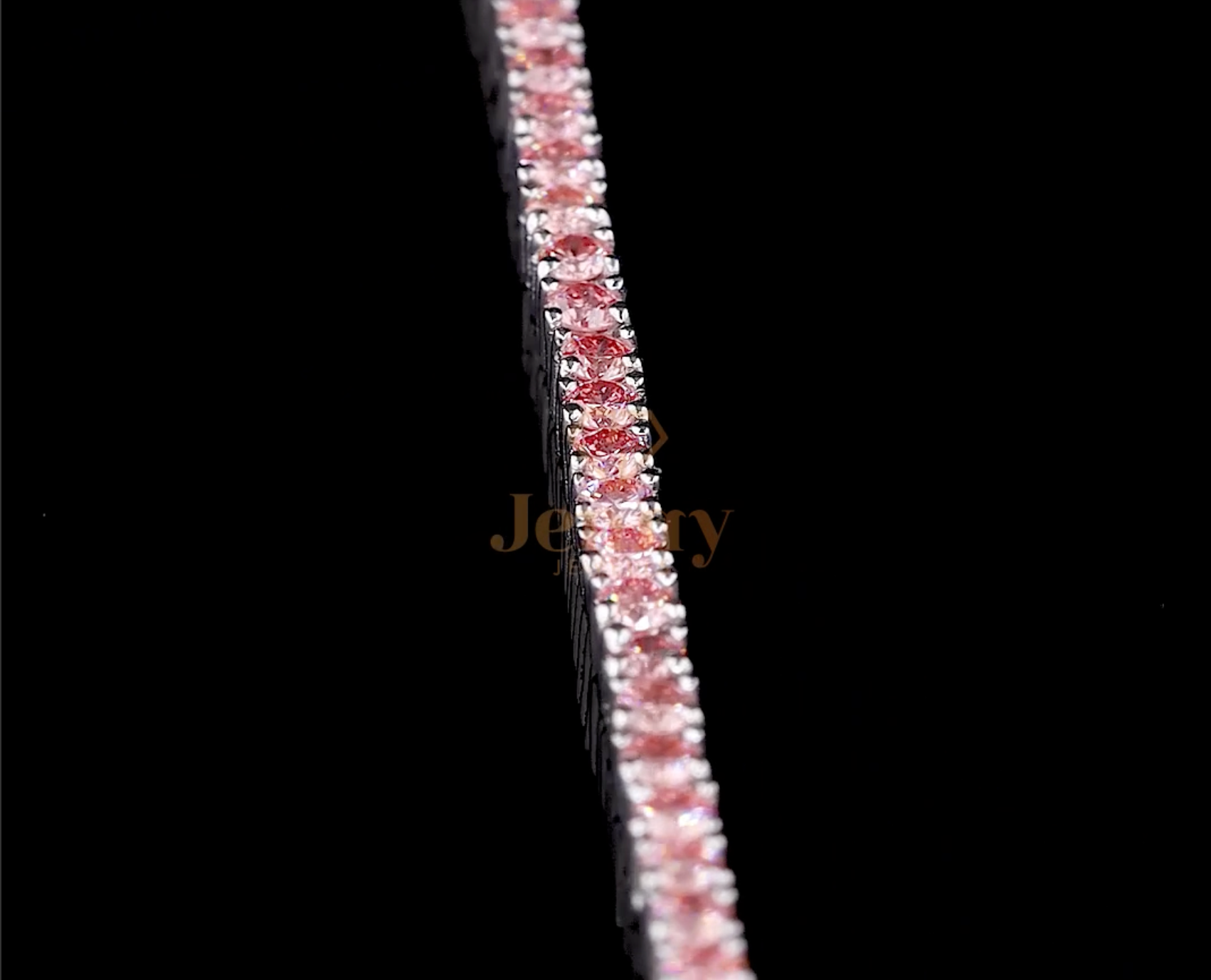 Pink Tennis Bracelet with lab-grown pink diamonds set in white, yellow, or rose gold. A sophisticated and romantic jewelry piece, perfect for layering or wearing solo.