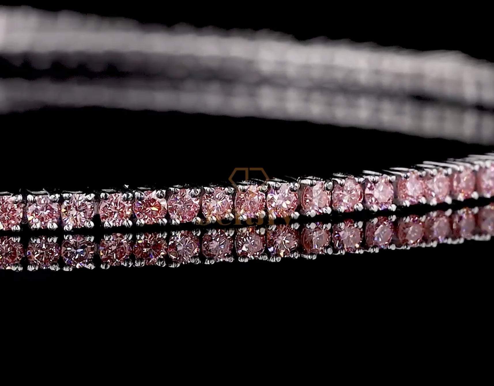 Pink Tennis Bracelet with lab-grown pink diamonds set in white, yellow, or rose gold. A sophisticated and romantic jewelry piece, perfect for layering or wearing solo.