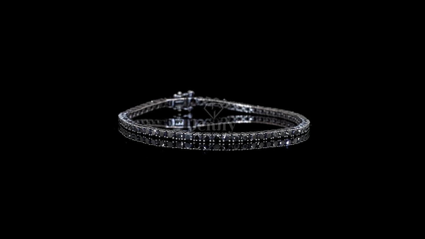 Elegant black diamond tennis bracelet with 62 stones, 4.91ct total weight, 7-inch length