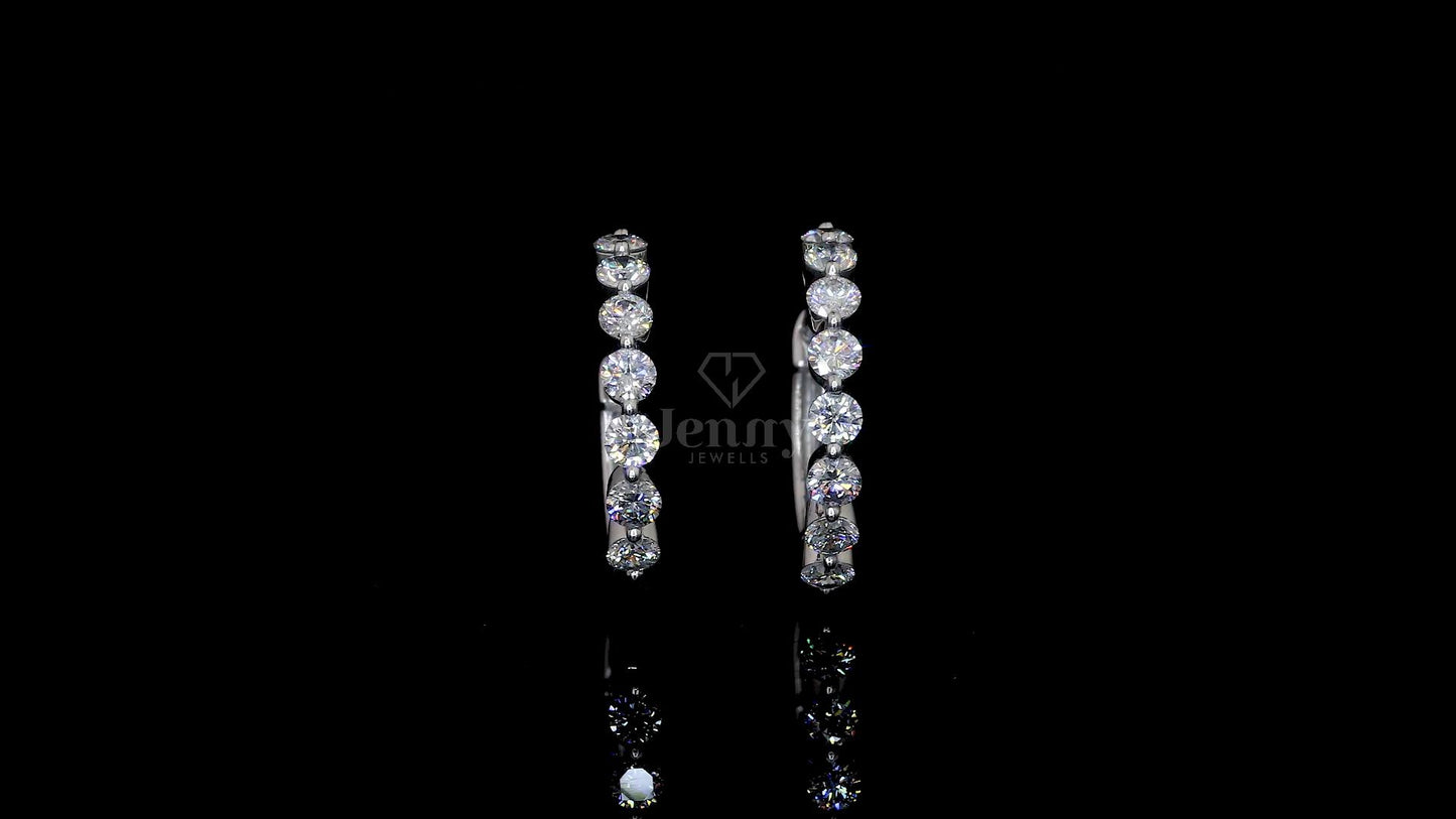 Elegant lab-grown diamond hoop earrings in white gold featuring 16 round diamonds totaling 1.60 carats.