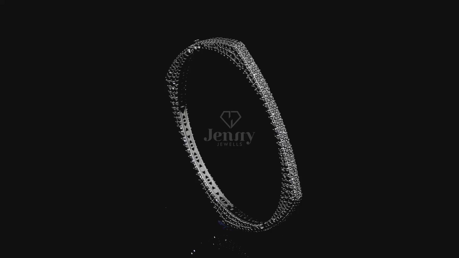 Close-up of black diamonds in square bangle bracelet setting