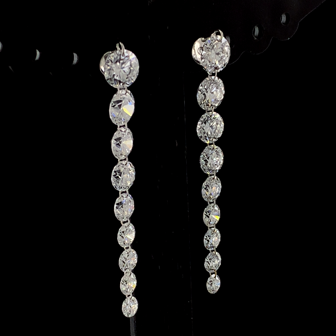 Graduated Diamond Earrings with lab-grown diamonds set in white, yellow, or rose gold. A luxurious and elegant jewelry piece designed for brilliance and sophistication.