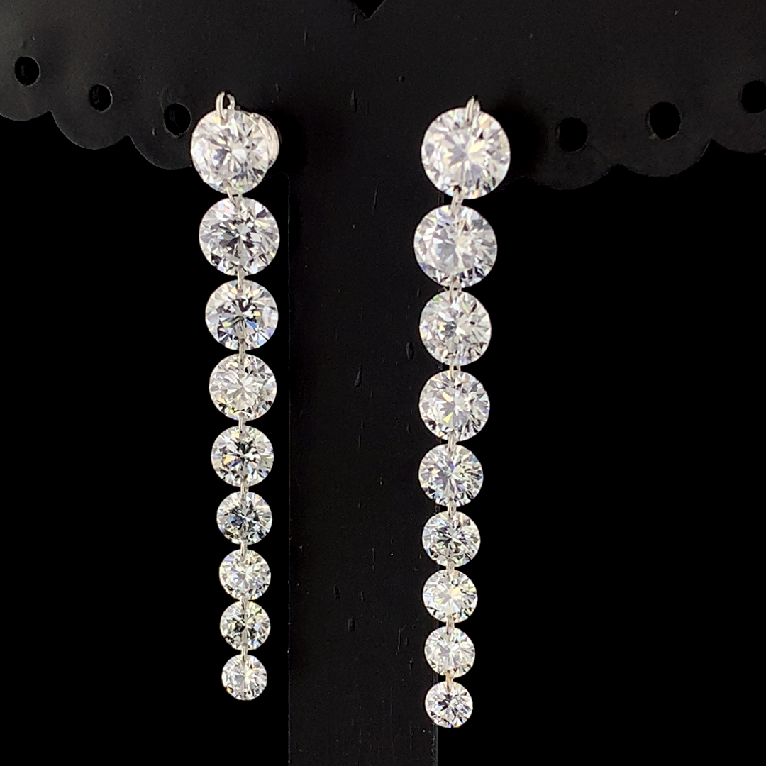 Graduated Diamond Earrings with lab-grown diamonds set in white, yellow, or rose gold. A luxurious and elegant jewelry piece designed for brilliance and sophistication.