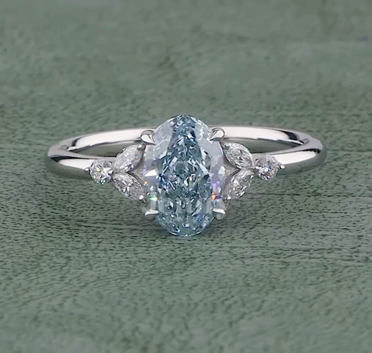 Azure Grace 1.31 Carat Fancy Vivid Blue Oval Diamond Ring VVS (IGI Certified) | Jenny Jewells