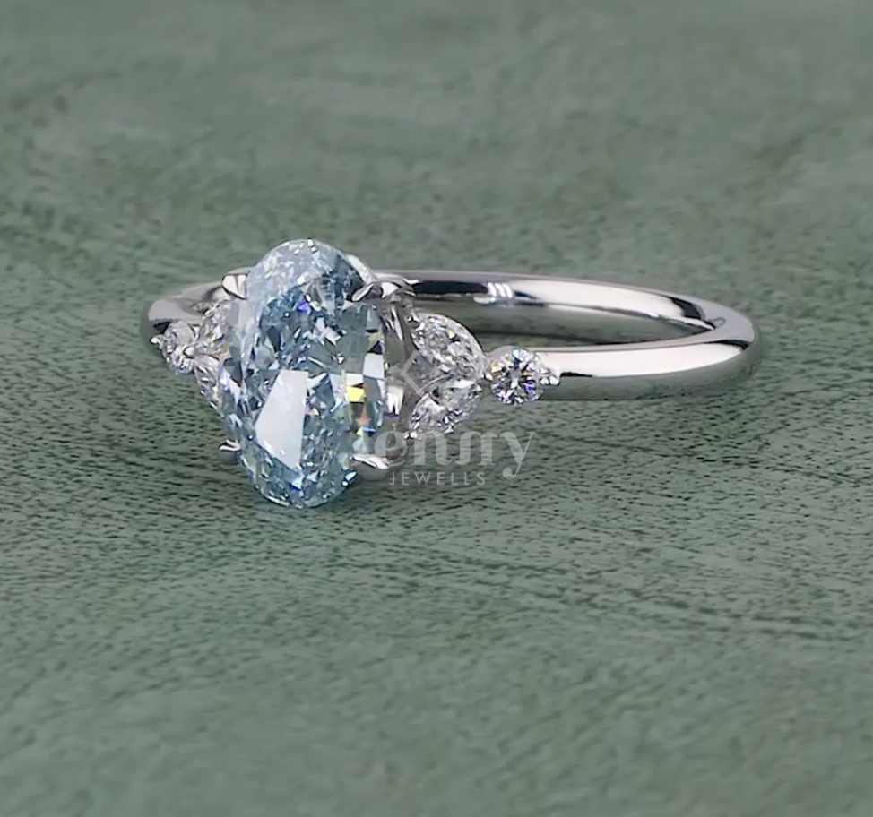 Azure Grace 1.31 Carat Fancy Vivid Blue Oval Diamond Ring VVS (IGI Certified) | Jenny Jewells - JENNY JEWELLS