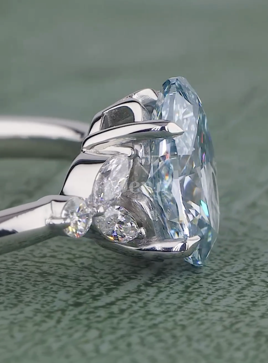 Azure Grace 1.31 Carat Fancy Vivid Blue Oval Diamond Ring VVS (IGI Certified) | Jenny Jewells - JENNY JEWELLS