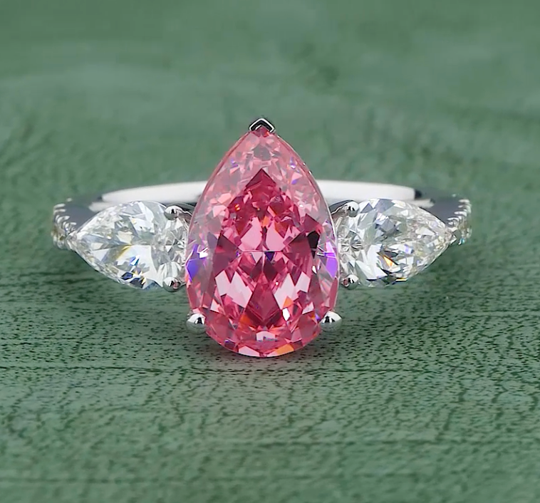 6.58 CT Ice Pink Pear Cut Lab Grown Diamond Ring | 8.08 CT E-F VVS Three Stone Ring | Jenny Jewells