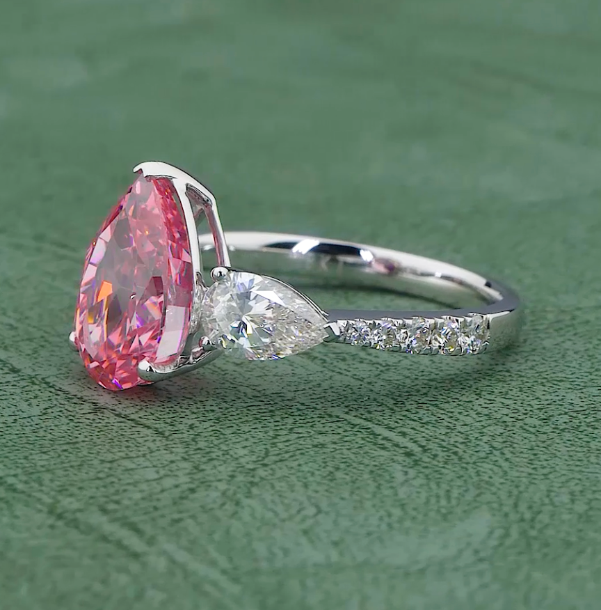 6.58 CT Ice Pink Pear Cut Lab Grown Diamond Ring | 8.08 CT E-F VVS Three Stone Ring | Jenny Jewells