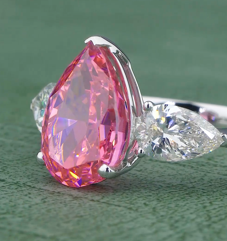 6.58 CT Ice Pink Pear Cut Lab Grown Diamond Ring | 8.08 CT E-F VVS Three Stone Ring | Jenny Jewells