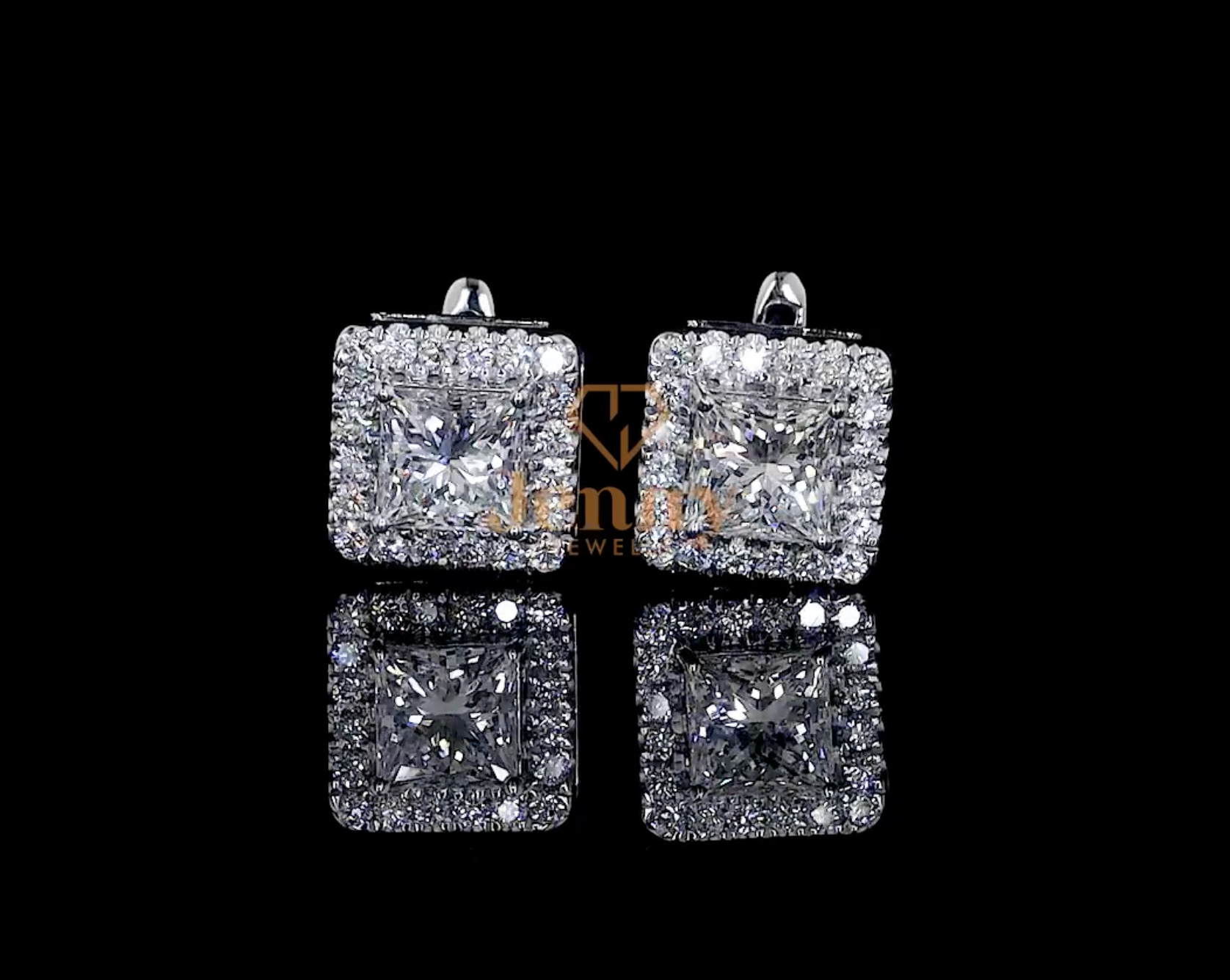 Princess Diamond Halo Earrings with a princess-cut diamond center and round diamond halo, set in white, yellow, or rose gold. A bold and elegant jewelry piece.