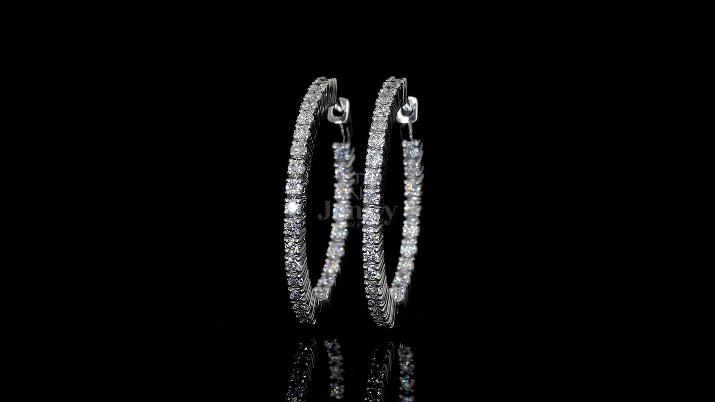 Close-up of 56 finely set lab-grown diamonds on bangle-style hoop earrings