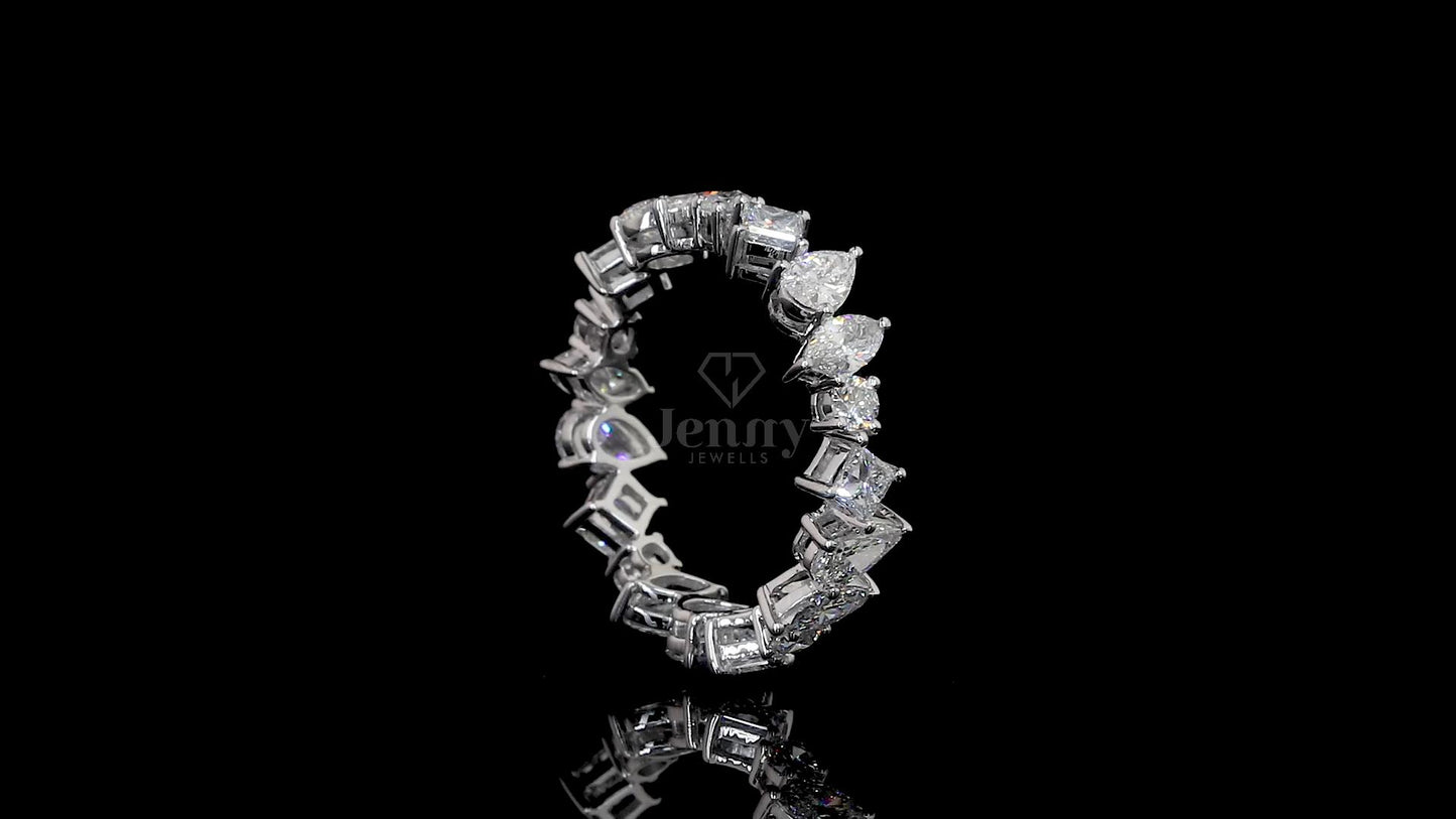 Mixed cut eternity ring with 4 Ct lab-grown diamonds in princess, pear, marquise, and round shapes, set in 14K or 18K gold – Jenny Jewells

