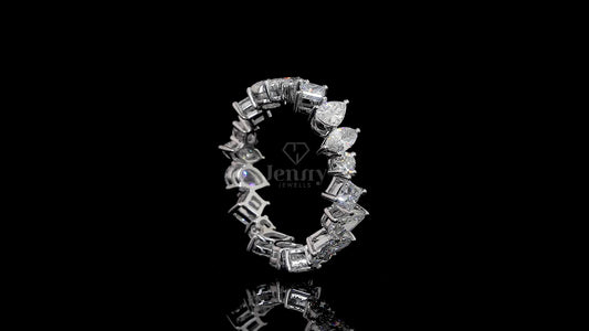 Mixed cut eternity ring with 4 Ct lab-grown diamonds in princess, pear, marquise, and round shapes, set in 14K or 18K gold – Jenny Jewells

