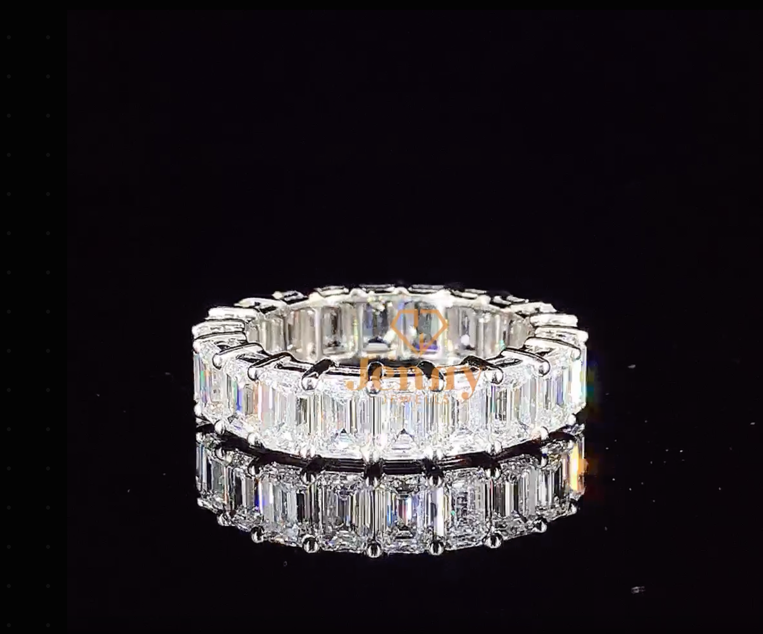 Full eternity band with vibrant emerald gemstones, set in white, yellow, or rose gold. A timeless and elegant stacking ring for any occasion.