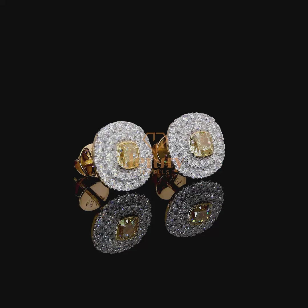 Yellow Diamond Double Halo Earrings with a vibrant center stone, set in white, yellow, or rose gold, surrounded by white diamonds for enhanced brilliance and elegance.