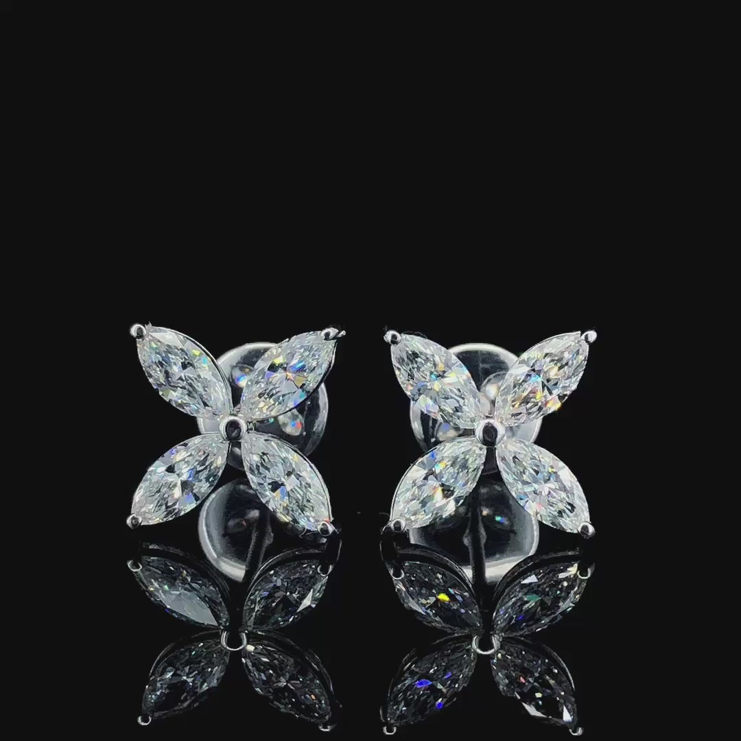 Floral-inspired earrings with marquise-cut diamonds set in white, yellow, or rose gold. A timeless and elegant jewelry piece for any occasion