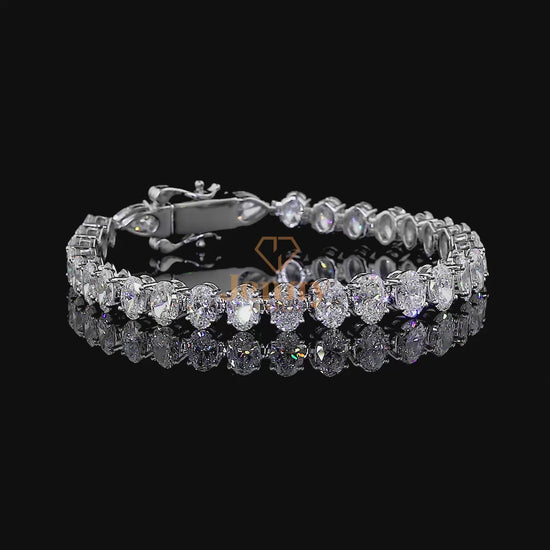 Oval-Cut Diamond Tennis Bracelet crafted in premium gold, showcasing a timeless design with exceptional brilliance and refined elegance.