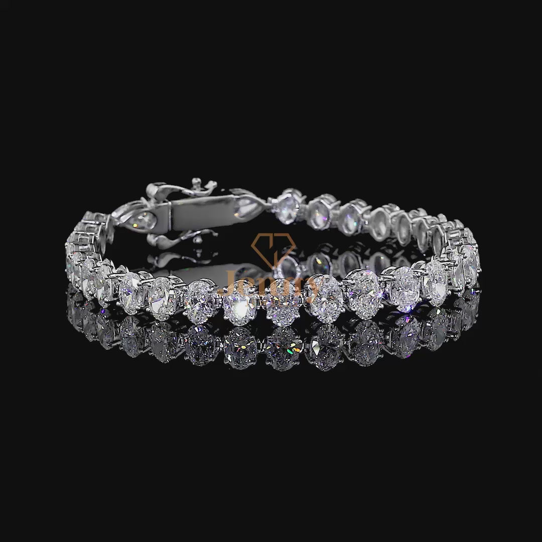 Oval-Cut Diamond Tennis Bracelet crafted in premium gold, showcasing a timeless design with exceptional brilliance and refined elegance.