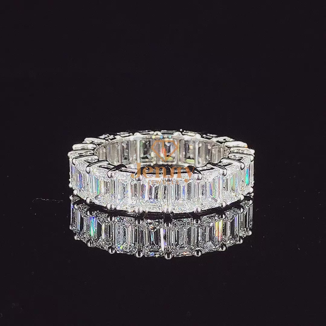 Full eternity band with vibrant emerald gemstones, set in white, yellow, or rose gold. A timeless and elegant stacking ring for any occasion.