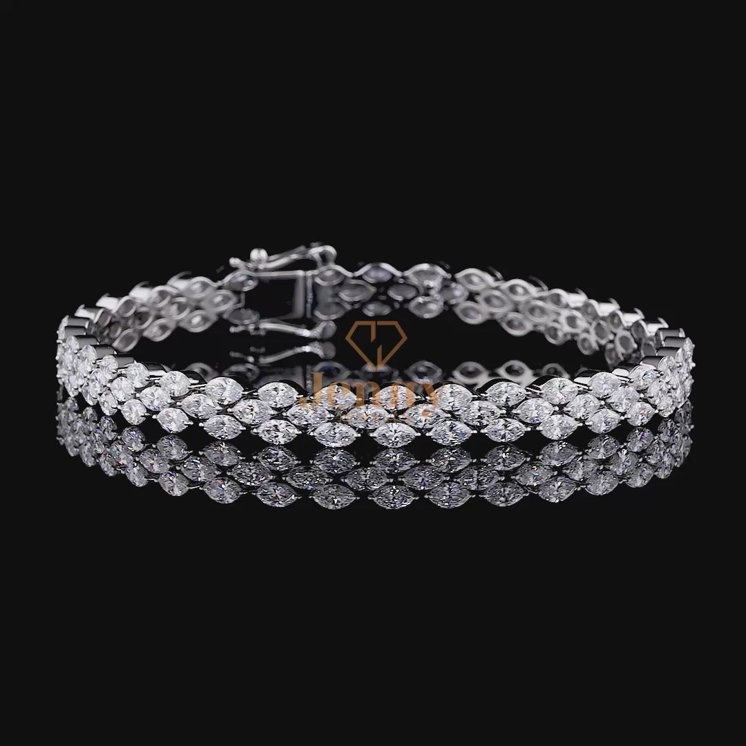 6.52 CT Marquise-Cut Diamond Tennis Bracelet featuring a seamless row of diamonds in white, yellow, or rose gold with a prong setting and secure box clasp. A refined and timeless jewelry piece.