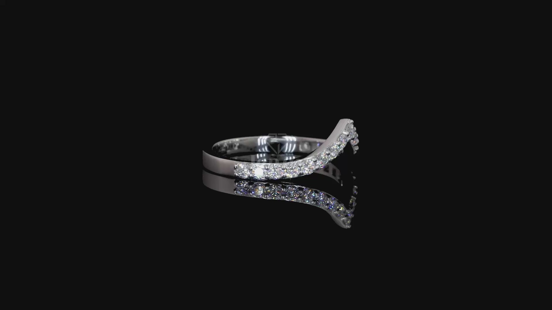 Close-up of 17 round brilliant diamonds in a single line diamond ring